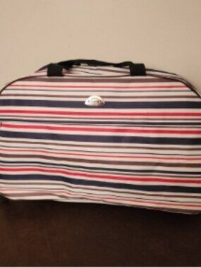 Somar Rolling Duffle Bag, boasting a vibrant multicolor striped design